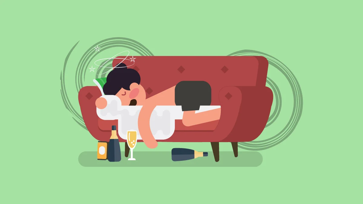 Drunk Man Lying on the Couch with Alcoholic Drinks and Wine Glass on the Floor