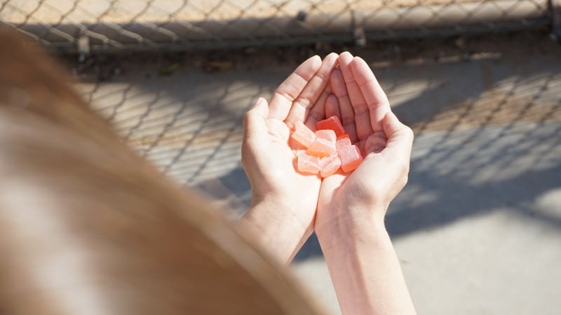 hand holding Gummies