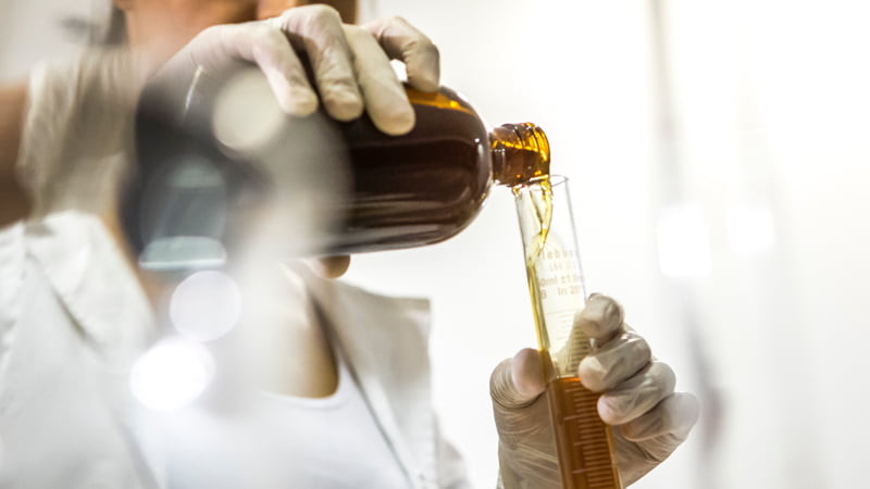 a lab working testing CBD extract potency