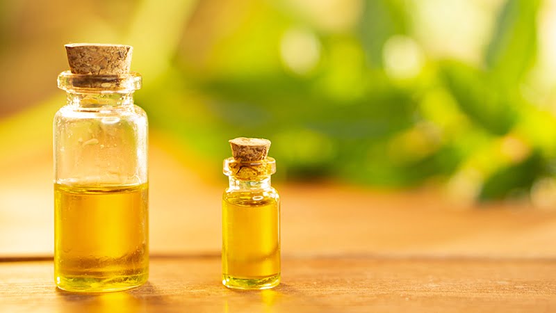 bottles of CBD oil extract on a table