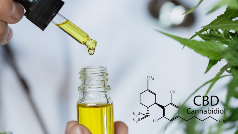 Doctor Holding CBD Oil with CBD Chemical Structure