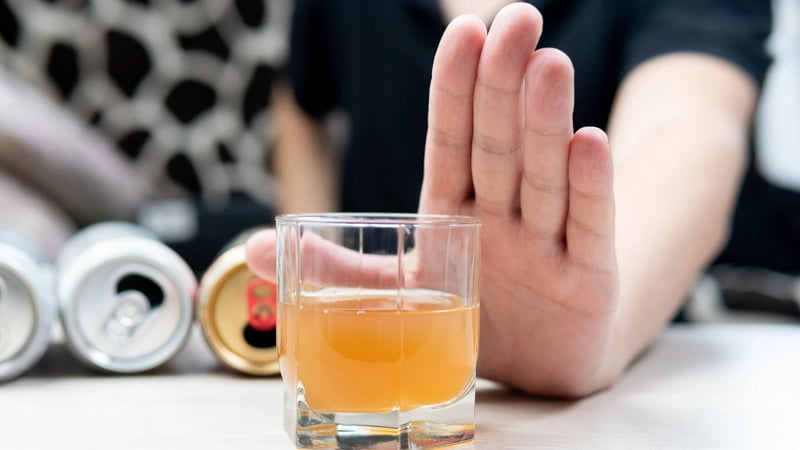Hand Refuse a Glass of Alcoholic Drink