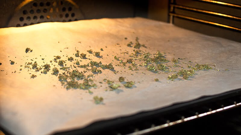 heating crushed hemp flower bud using the oven