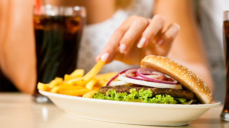 Image of a Person Picking up Food