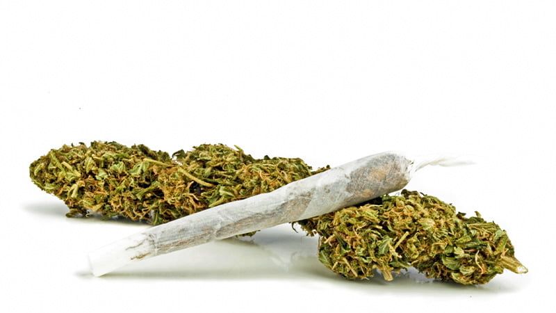 Marijuana buds and a joint with HHC cannabinoid.