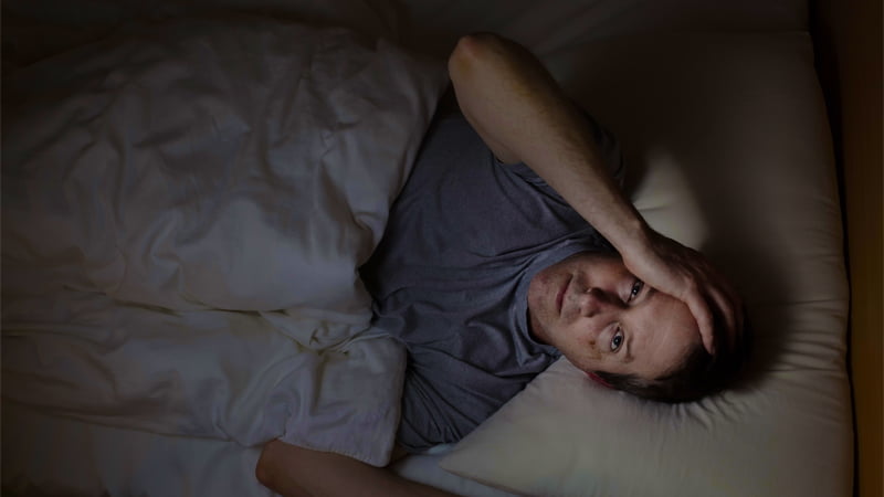 Man having trouble with sleep