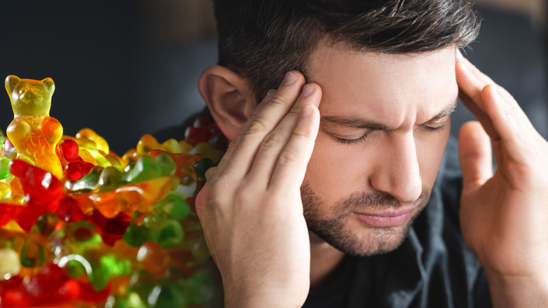 Man having a headache from too much edibles
