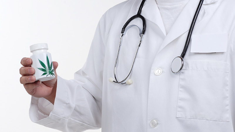 Image of doctor holding Cannabis product