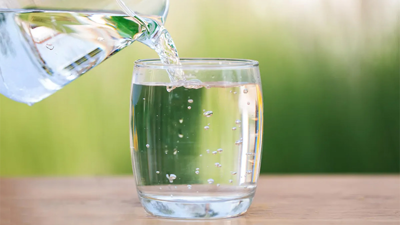 Water being pour into a glass