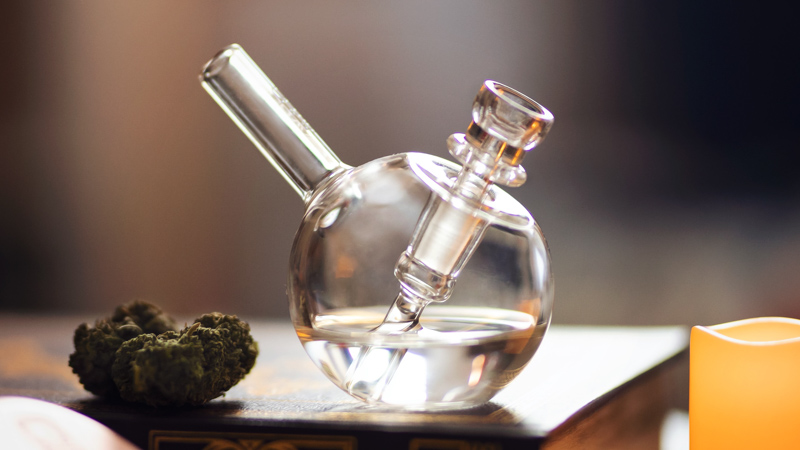image of cannabis flowers and water pipe