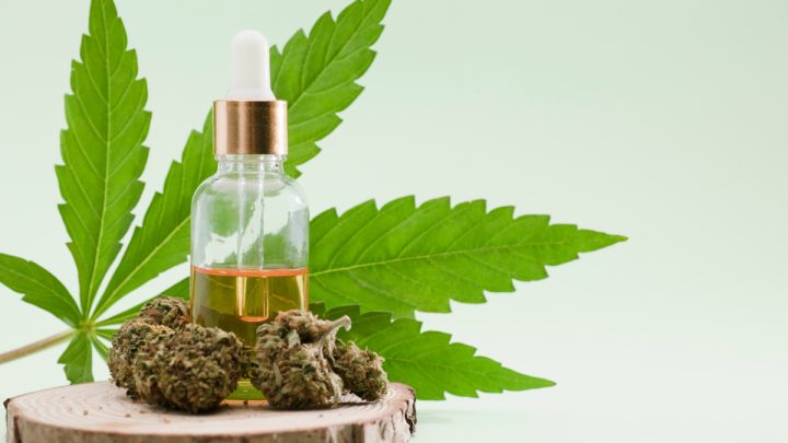 Delta 8 THC tincture with hemp leaf and hemp buds