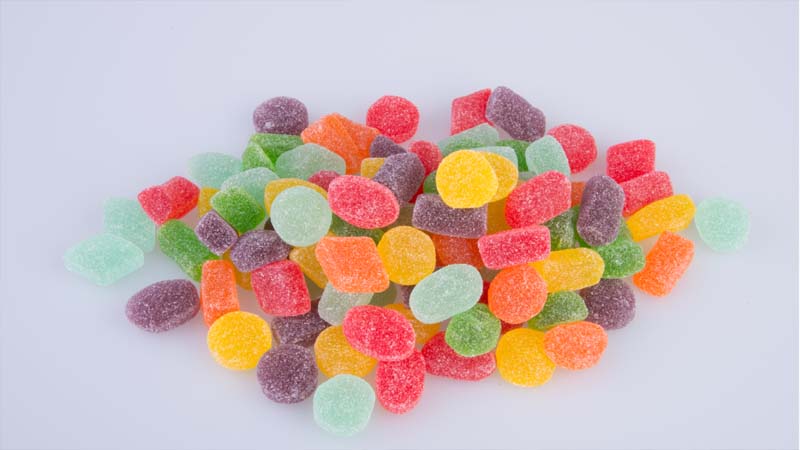 An image of gummies on white background